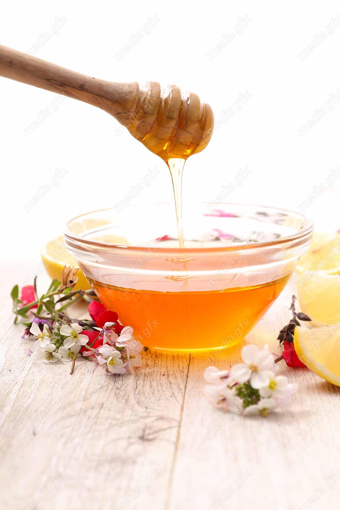 عکس با کیفیت عسل طبیعی در ظرف شیشه ای MJ002278