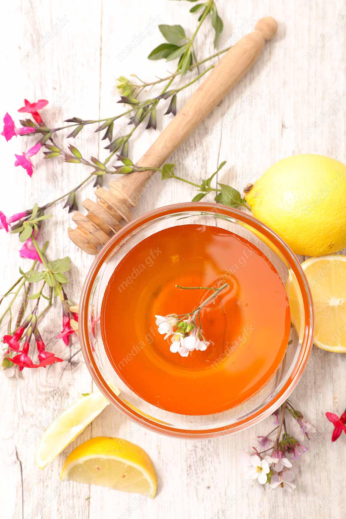 عکس با کیفیت عسل طبیعی در ظرف شیشه ای MJ002279