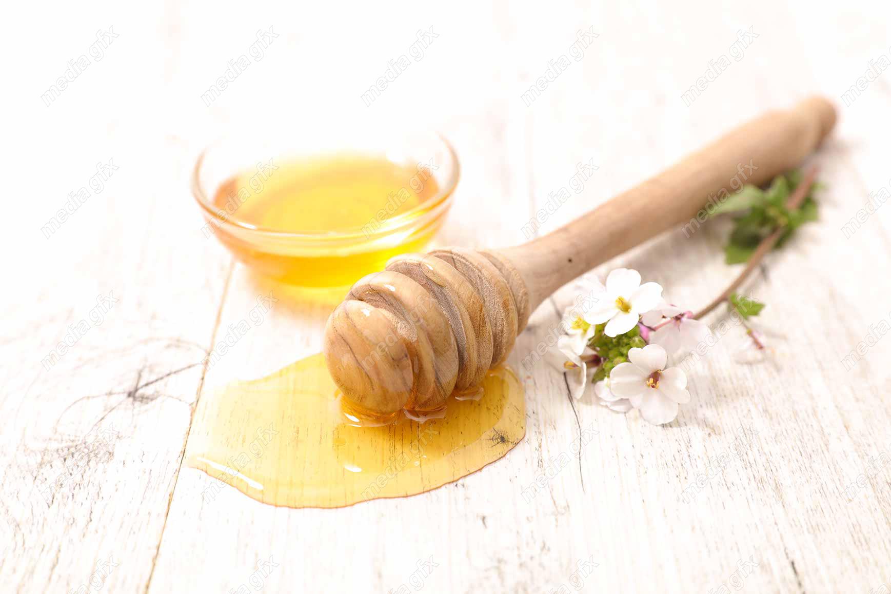 عکس با کیفیت عسل طبیعی در ظرف شیشه ای MJ002280