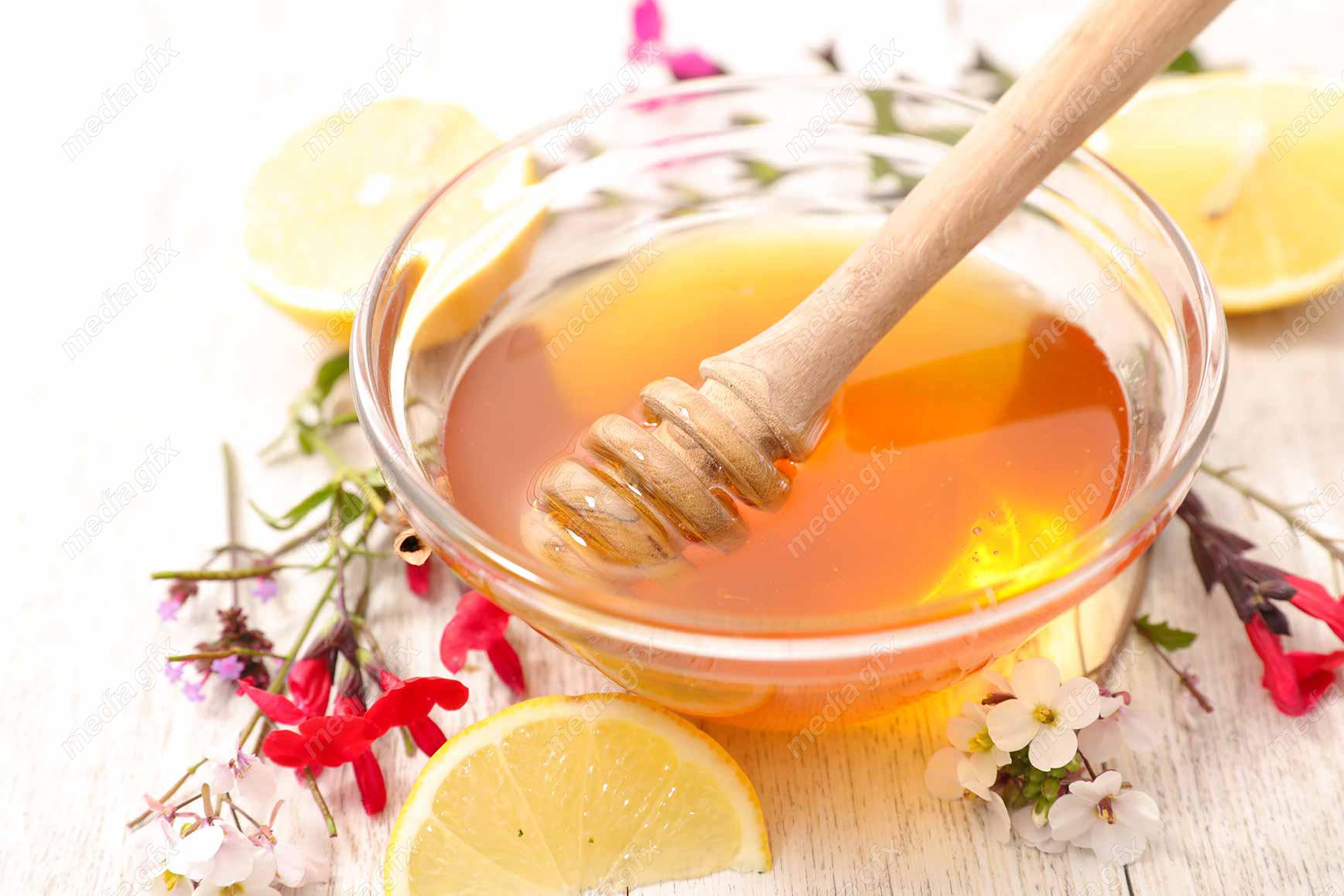 عکس با کیفیت عسل طبیعی در ظرف شیشه ای MJ002282